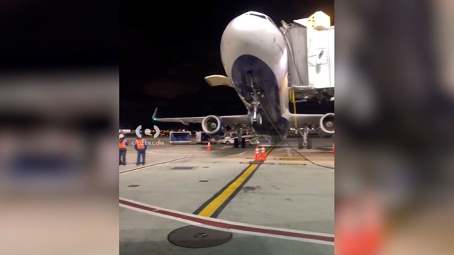 Máy bay “bốc đầu” như bập bênh tại sân bay JFK - Ảnh 1.