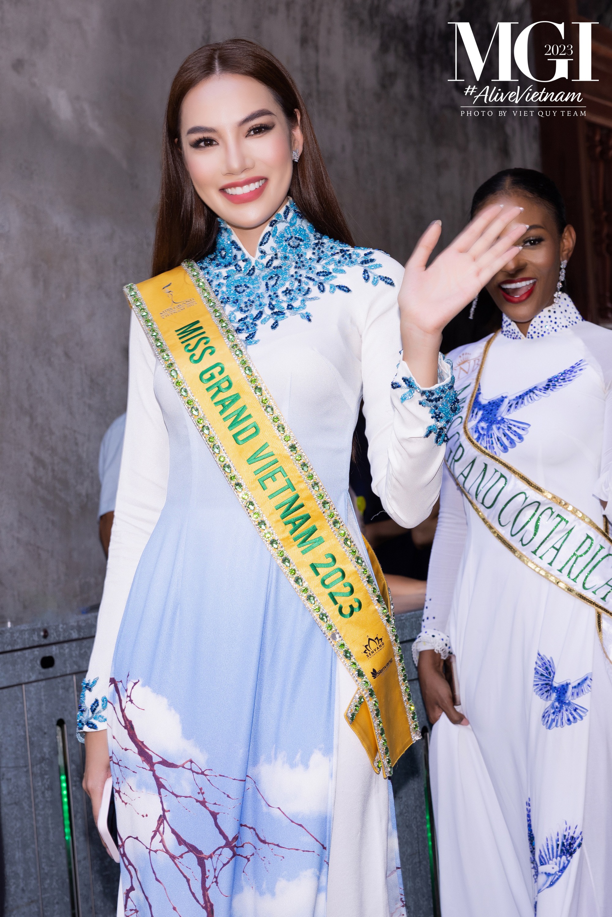 Lê Hoàng Phương cùng dàn thí sinh Miss Grand International duyên dáng trong tà áo dài - Ảnh 9.