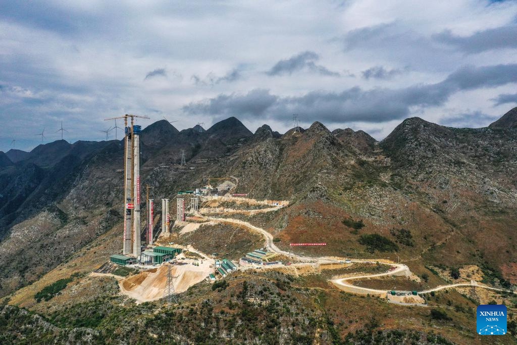 Trung Quốc sắp có cây cầu cao nhất thế giới bắc qua “vết nứt Trái Đất” - Ảnh 5.