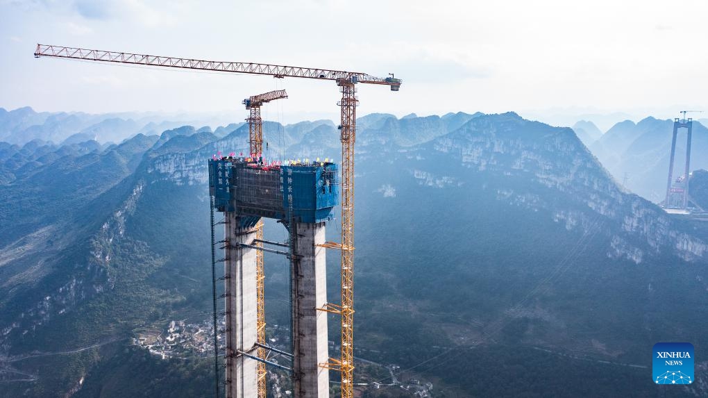 Trung Quốc sắp có cây cầu cao nhất thế giới bắc qua “vết nứt Trái Đất” - Ảnh 7.