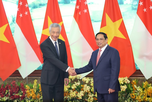 Cận cảnh Thủ tướng Phạm Minh Chính chủ trì lễ đón Thủ tướng Singapore Lý Hiển Long - Ảnh 8.