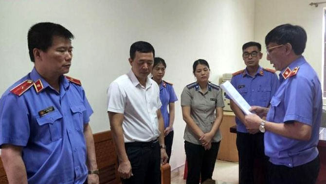 Viện Kiểm sát tối cao bắt bị can Trần Thị Hoa cán bộ thuộc Chi cục Thi hành án TP Yên Bái - Ảnh 1.
