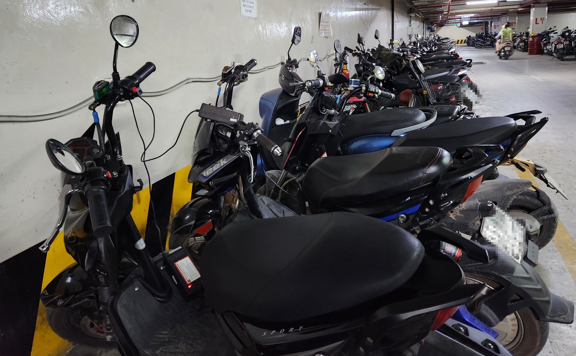 Hà Nội: Quận Thanh Xuân yêu cầu không để xe máy, xe điện ở chung cư mini - Ảnh 2.