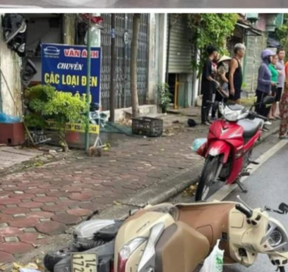 Xe máy tông vào người phụ nữ sang đường trên Quốc lộ 18 ở Quảng Ninh, hai người nhập viện - Ảnh 1.