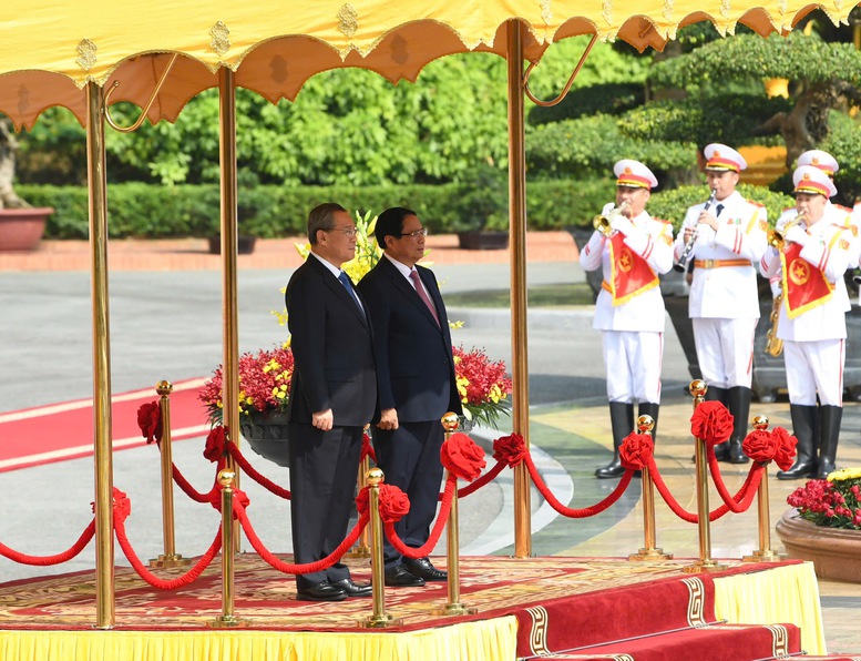 Thủ tướng Phạm Minh Chính chủ trì lễ đón chính thức Thủ tướng Trung Quốc Lý Cường- Ảnh 1.