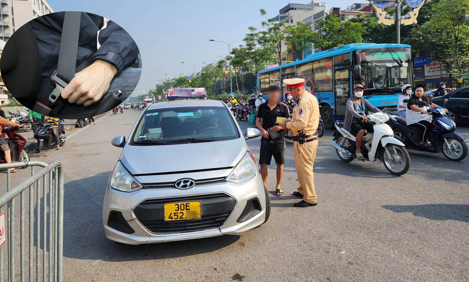 Hành khách sẽ bị phạt tiền khi đi taxi không thắt dây an toàn- Ảnh 1.