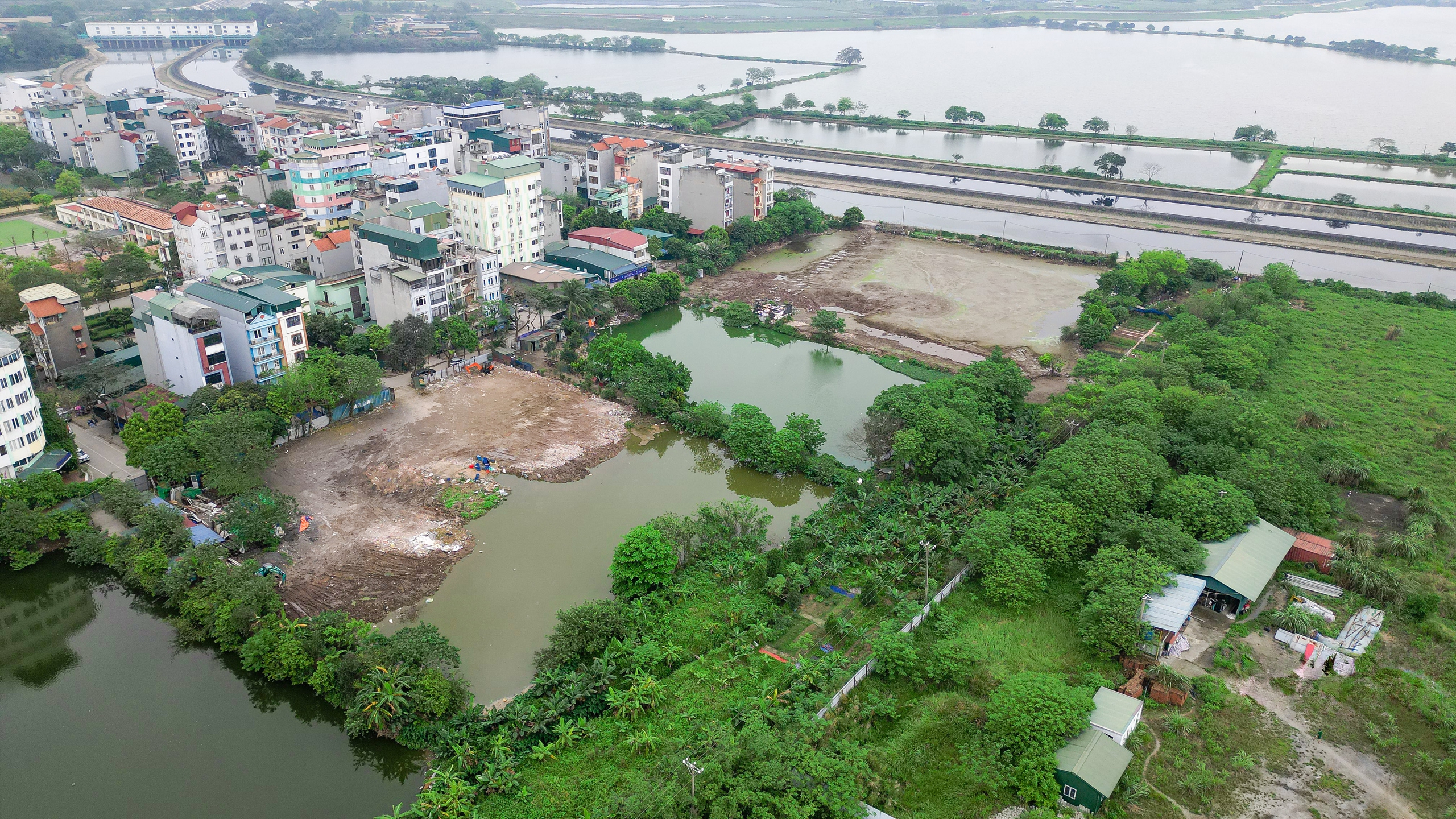 Hà Nội: Rầm rộ lấp ao hồ, xả thải gây ô nhiễm môi trường- Ảnh 1.