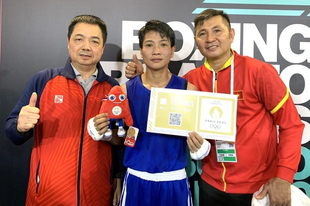 Thắng bằng điểm tuyệt đối, nữ võ sĩ Việt Nam xuất sắc giành vé dự Olympic- Ảnh 1.