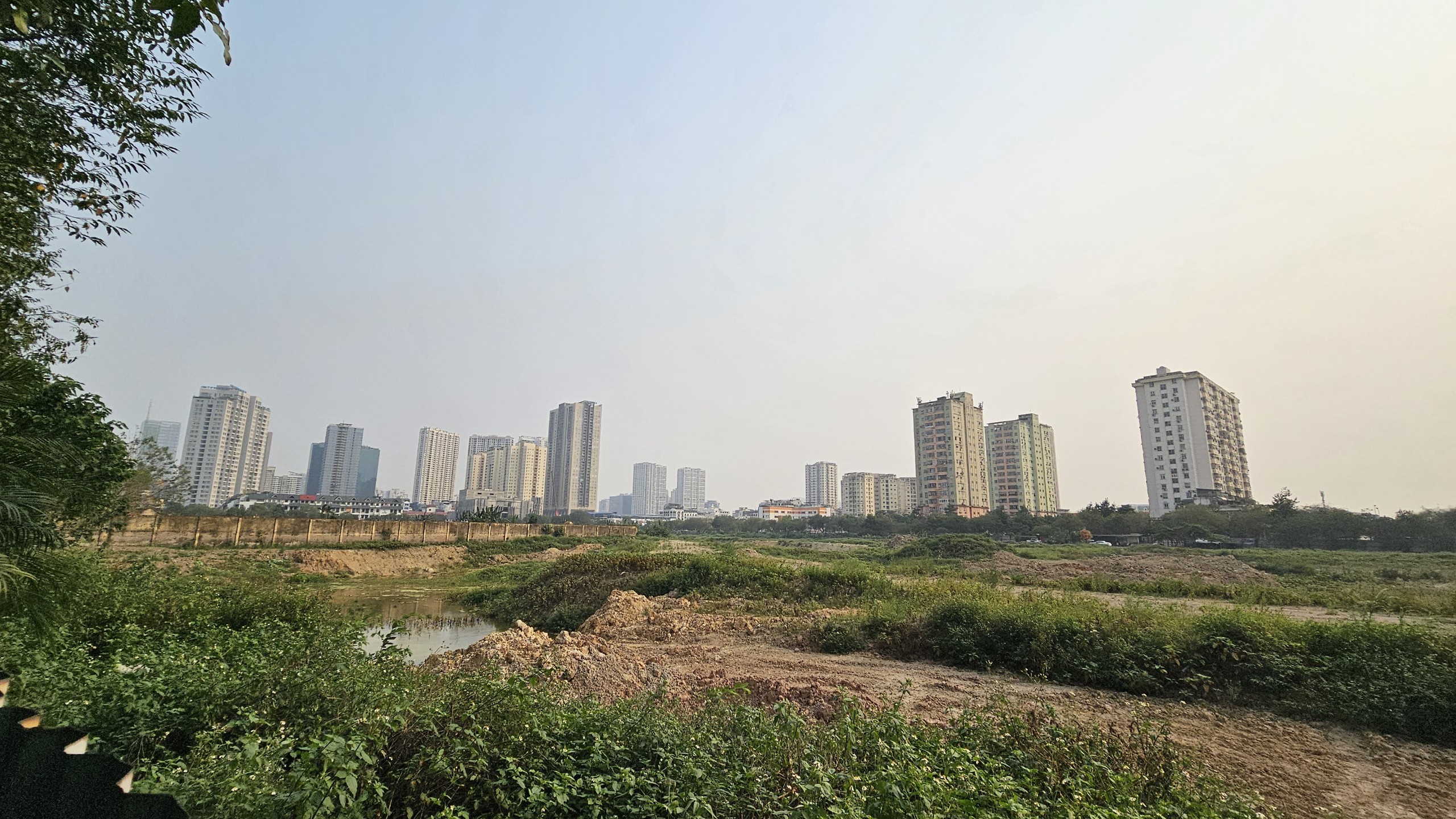 Vì sao dự án công viên - hồ điều hòa KĐT Tây Nam Hà Nội vẫn là bãi đất hoang?- Ảnh 1.