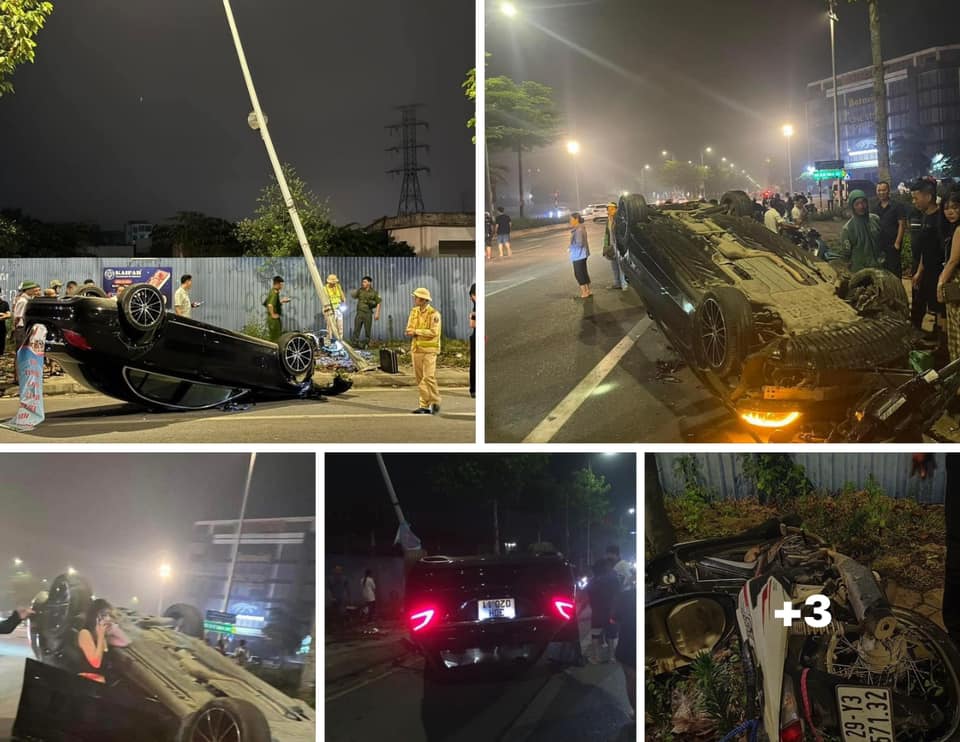 Ô tô Mercedes "phơi bụng" sau va chạm với xe máy ở Hà Nội- Ảnh 1.
