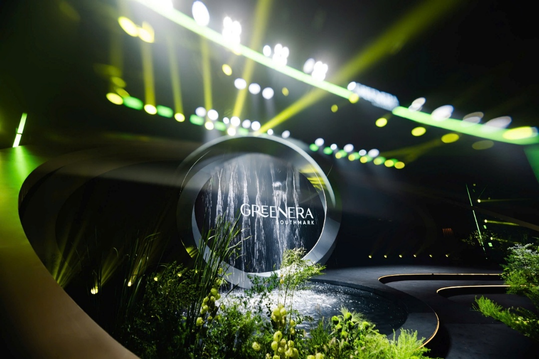 A stage with a fountain and lights  Description automatically generated with medium confidence