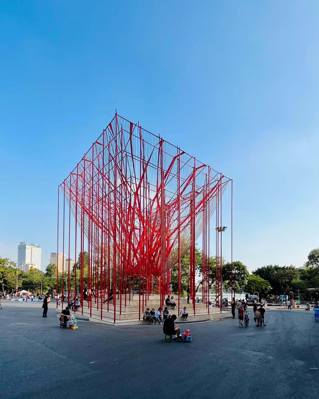 A large square structure with many red tubes  AI-generated content may be incorrect.