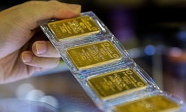 Vàng thế giới vượt mốc 4.000 USD trong làn sóng tìm kiếm tài sản an toàn- Ảnh 2.