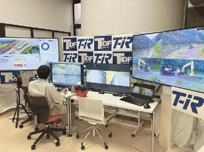 A person sitting at a desk with several monitors  AI-generated content may be incorrect.