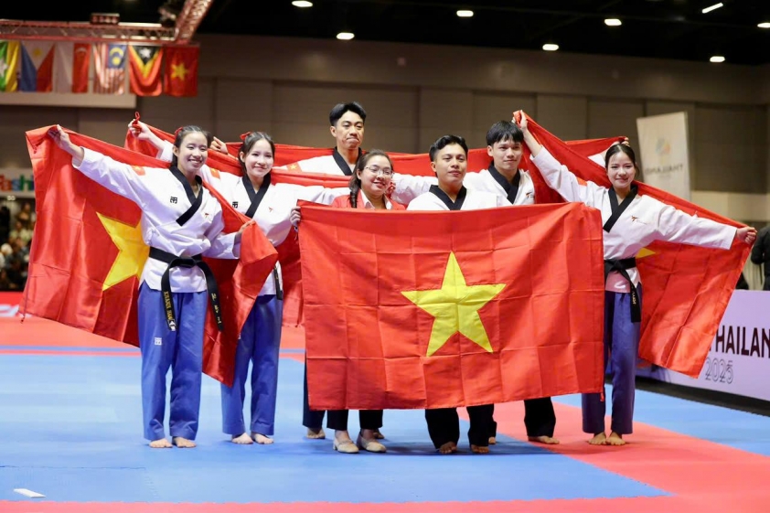 Vietnam wint opnieuw een gouden medaille in taekwondo tijdens de 33e SEA Games - Foto 1. Việt Nam giành thêm HCV ở môn Taekwondo tại SEA Games 33- Ảnh 1.