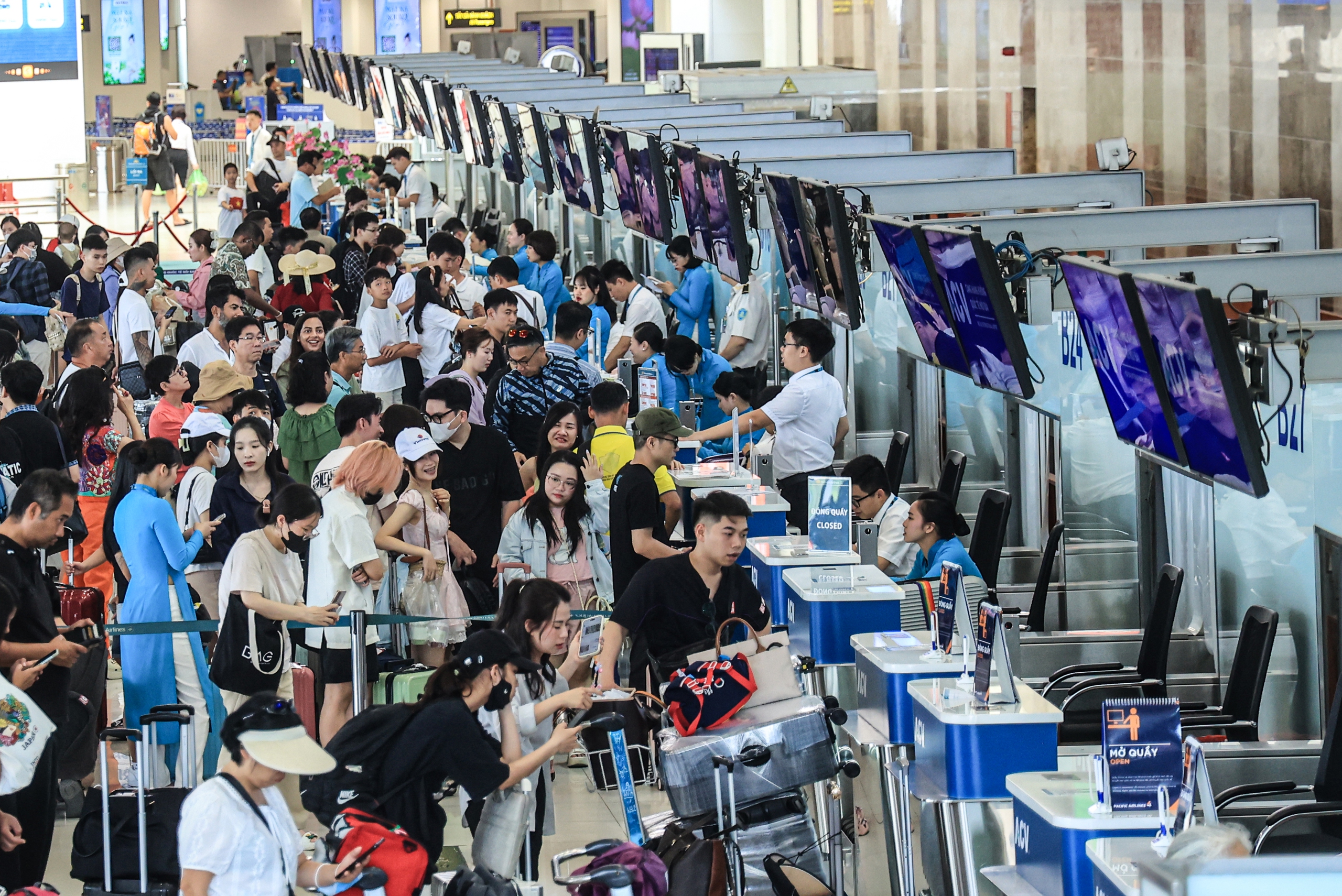 Kh&ocirc;ng để qu&aacute; tải, &ugrave;n tắc tại c&aacute;c cảng h&agrave;ng kh&ocirc;ng dịp cao điểm- Ảnh 1.