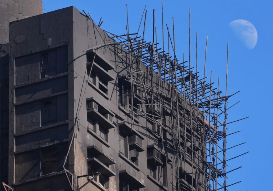 A building under construction with scaffolding  AI-generated content may be incorrect.