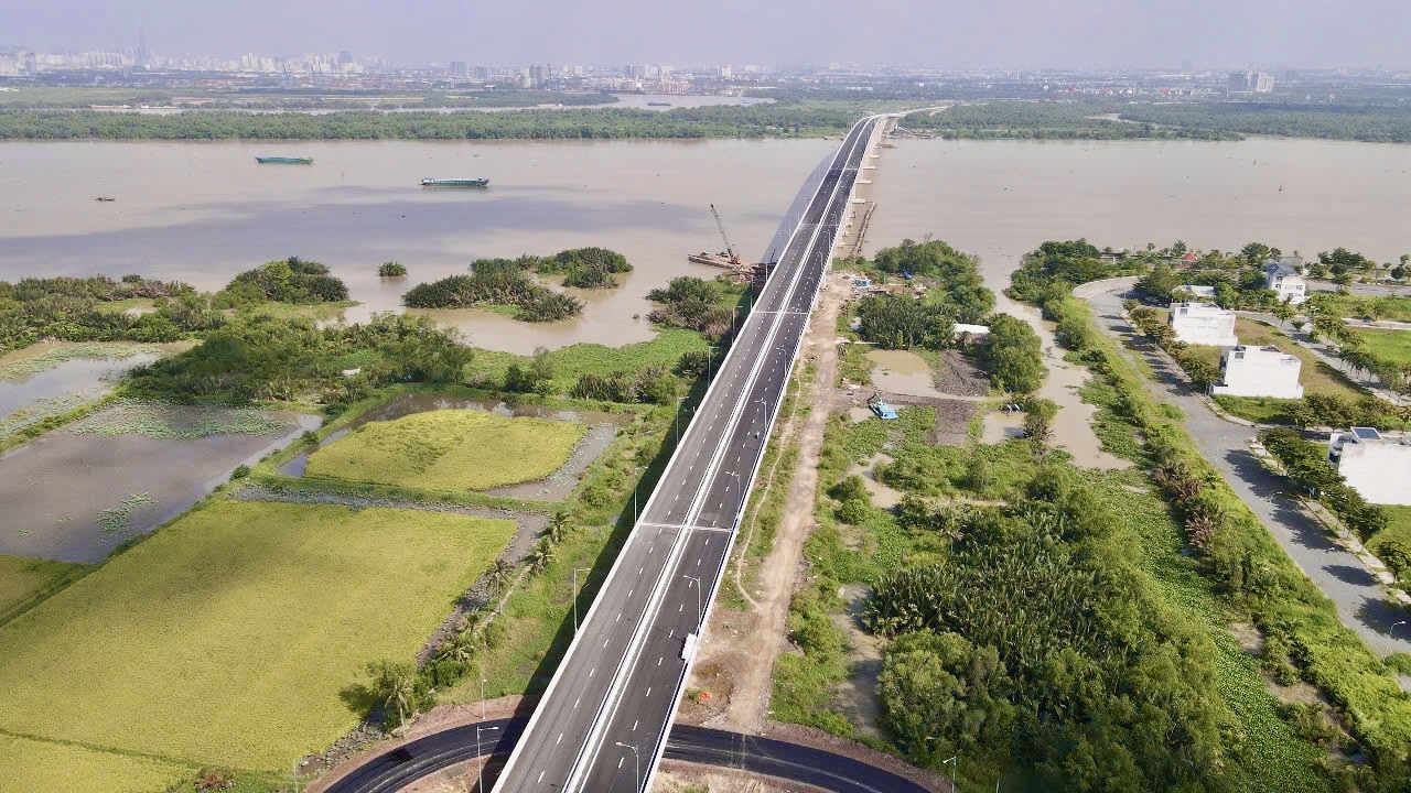 Người dân phấn khởi qua cầu Nhơn Trạch trong ngày đầu thông xe- Ảnh 12.