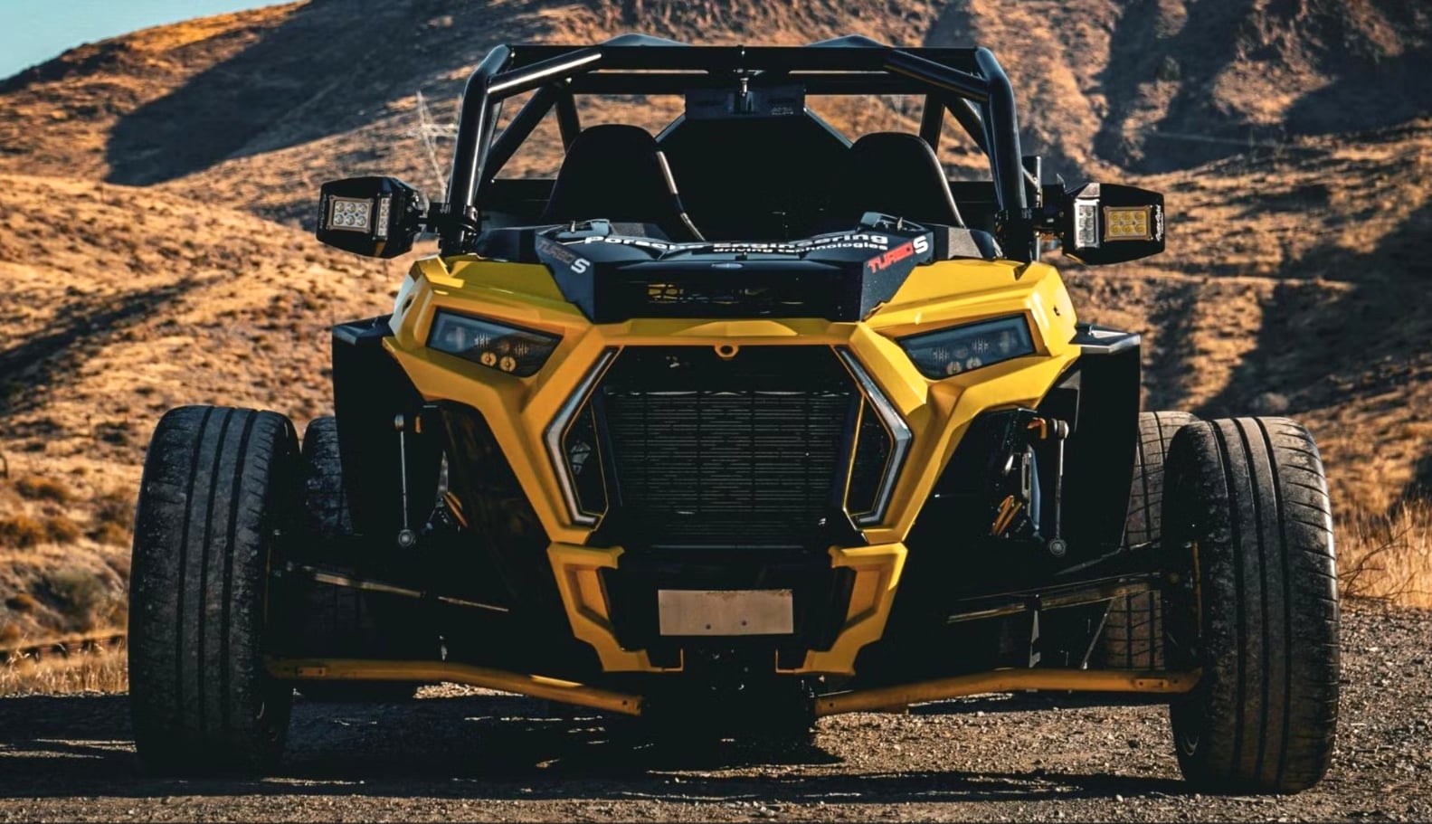 Xe địa hình RZR khoác lên mình phong cách Porsche 911- Ảnh 1. Xe địa hình RZR khoác lên mình phong cách Porsche 911- Ảnh 1.