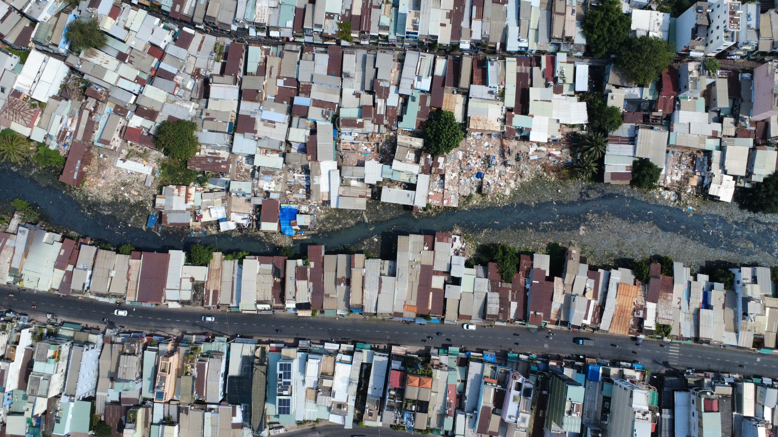 Dọn nhà đón cái Tết cuối cùng bên dòng rạch Xuyên Tâm ô nhiễm sắp được cải tạo- Ảnh 1.