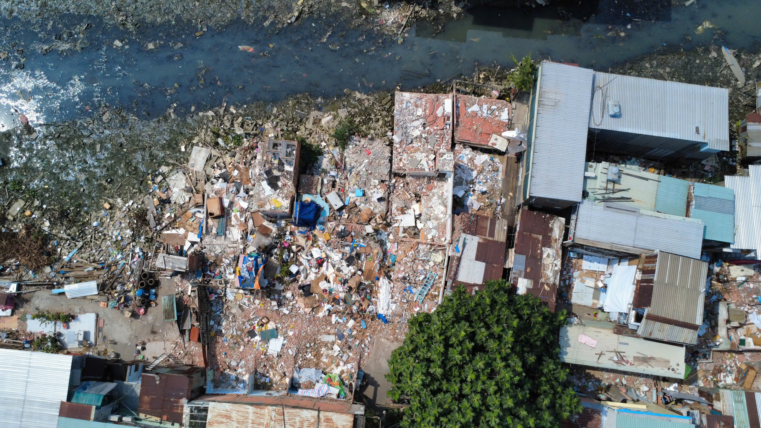 Dọn nhà đón cái Tết cuối cùng bên dòng rạch Xuyên Tâm ô nhiễm sắp được cải tạo- Ảnh 17.