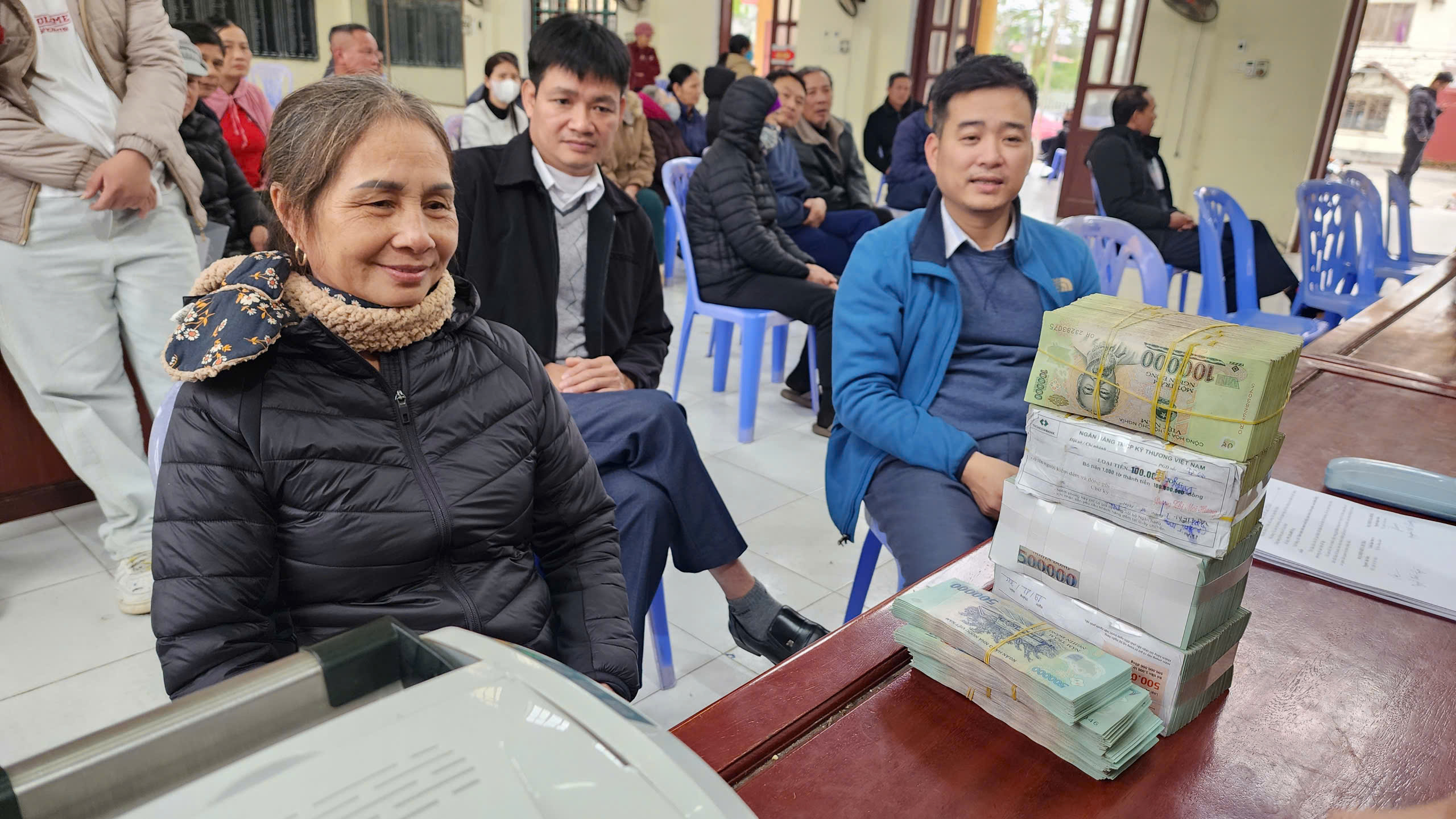 Cận Tết, người d&acirc;n phấn khởi nhận bồi thường giải ph&oacute;ng mặt bằng s&acirc;n bay Gia B&igrave;nh- Ảnh 6.