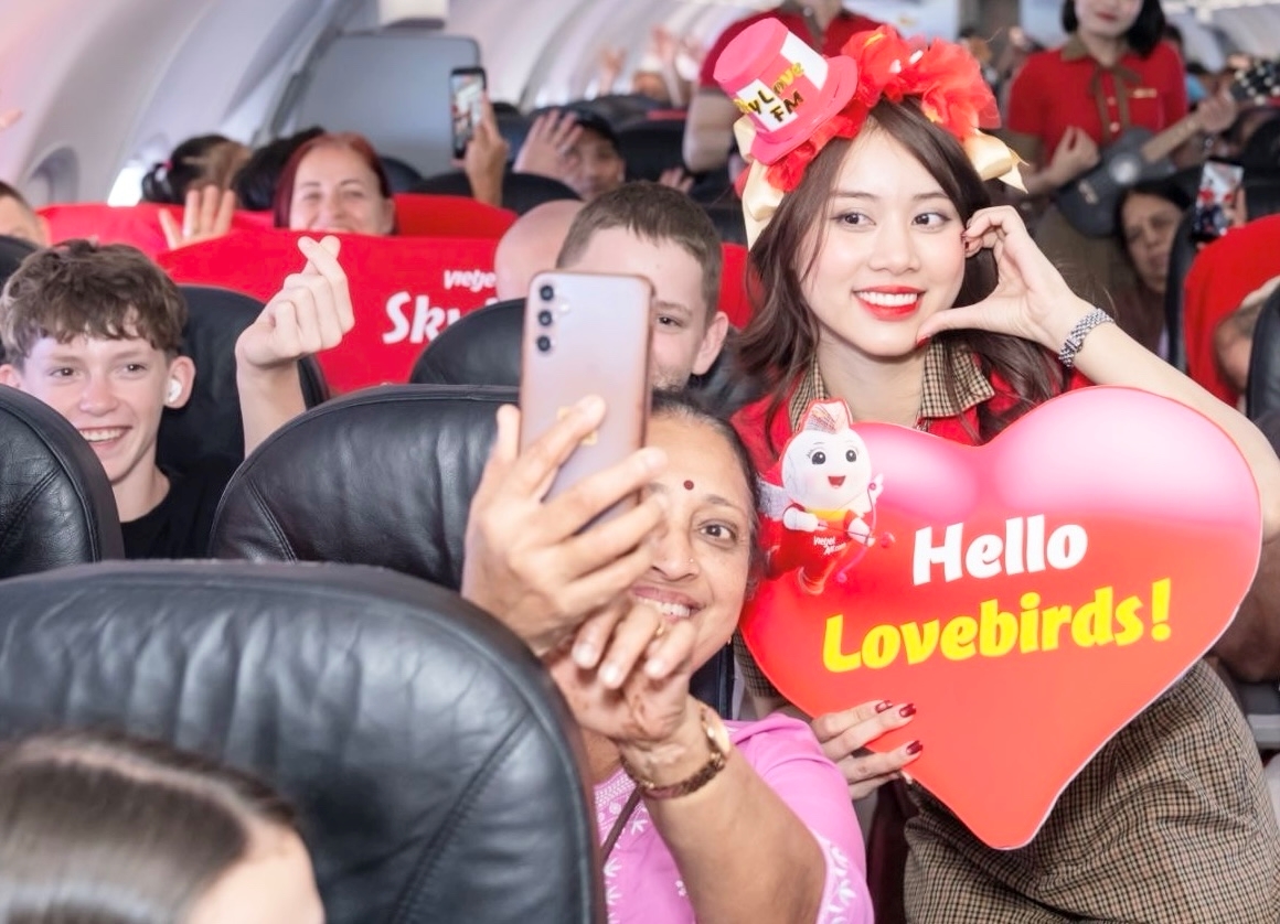 Trải nghiệm Valentine ngọt ng&agrave;o tr&ecirc;n bầu trời c&ugrave;ng Vietjet- Ảnh 4.