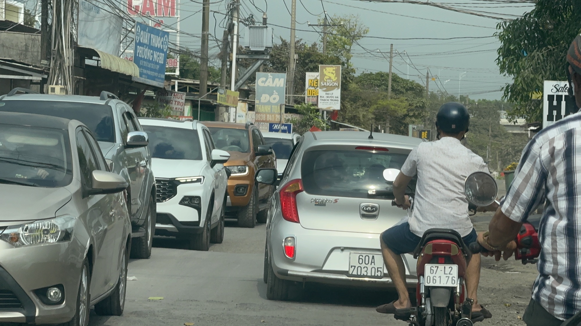 D&ograve;ng xe từ biển trở lại th&agrave;nh phố, cửa ng&otilde; Đồng Nai &ugrave;n ứ m&ugrave;ng 5 Tết- Ảnh 1.