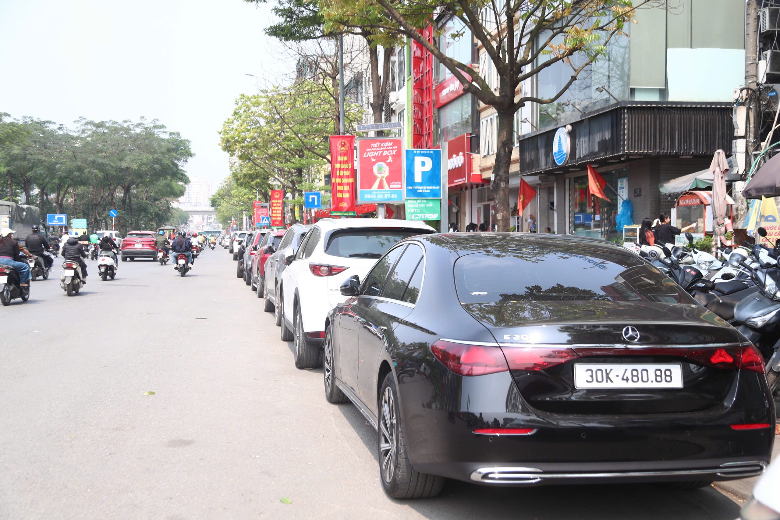 Nhiều điểm tr&ocirc;ng giữ xe ở H&agrave; Nội vạch sơn mờ, thậm ch&iacute; &ldquo;mất dấu&rdquo;- Ảnh 6.