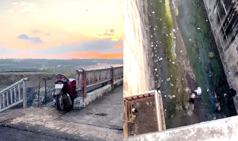 Người đ&agrave;n &ocirc;ng tử vong dưới cửa xả đập chứa nước Kr&ocirc;ng B&uacute;k hạ, tr&ecirc;n th&agrave;nh cầu c&oacute; chiếc xe m&aacute;y lơ lửng. (Ảnh cắt từ clip)