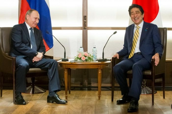 Tổng thống Nga Putin và Thủ tướng Nhật Abe tại cuộ