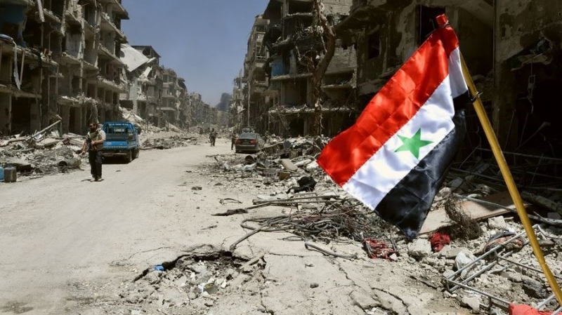 Cờ Syria được treo tại vùng Yarmouk