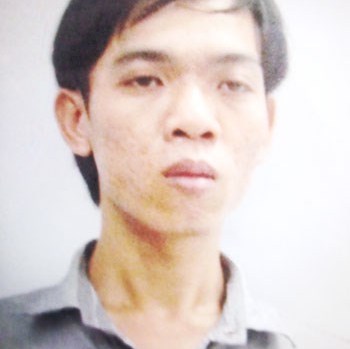 Châu Quang Đồng lúc bị bắt. (Ảnh: PLTPHCM)