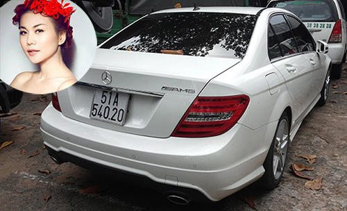 Chiếc Mercedes C300 của siêu mẫu Phạm Thị Thanh Hằng hiện đang bị tạm giữ tại bãi xe của Công an Q.3. (Ảnh: Tuổi trẻ)