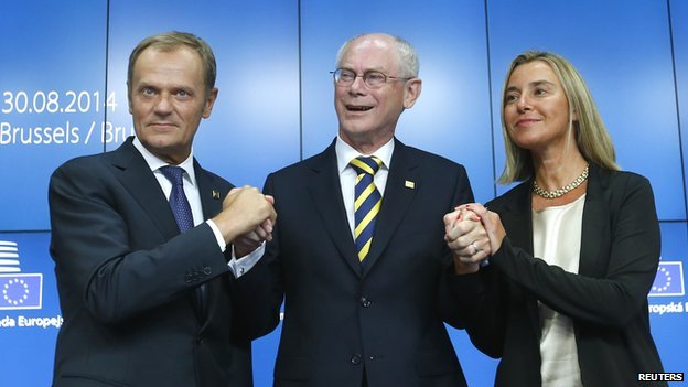 Mr Tusk (left) and Ms Mogherini flank outgoing council president Herman Van Rompuy.jpg