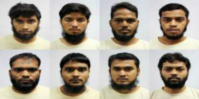 8 nghi phạm bị singapore bat giu