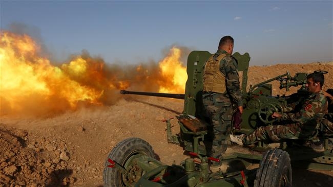 Iraqi Kurdish fighters fire anti-tank cannon near 