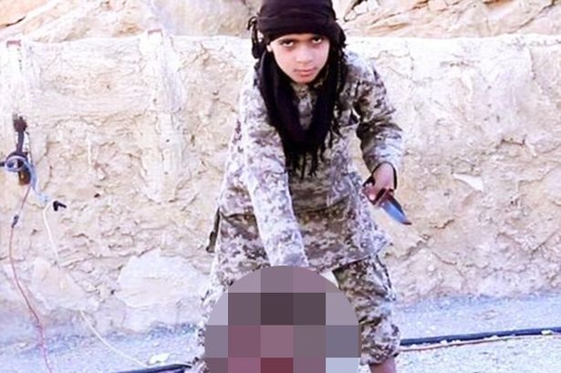 ISIS-Child-Soldier-Beheads-A-Man.