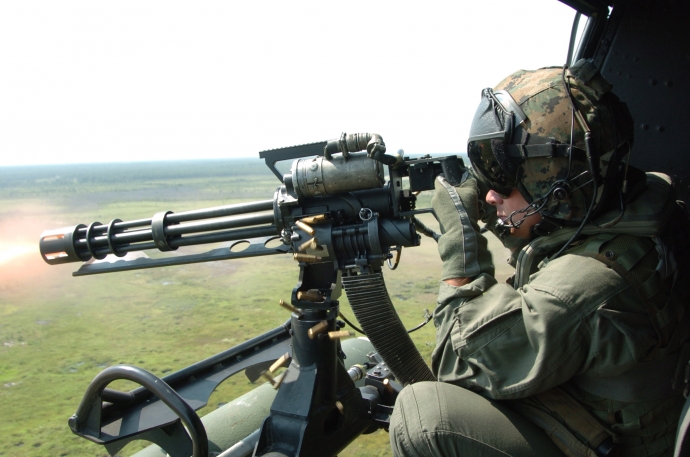 GAU-17_machine_gun_fired_from_UH-1N_Huey_in_2006