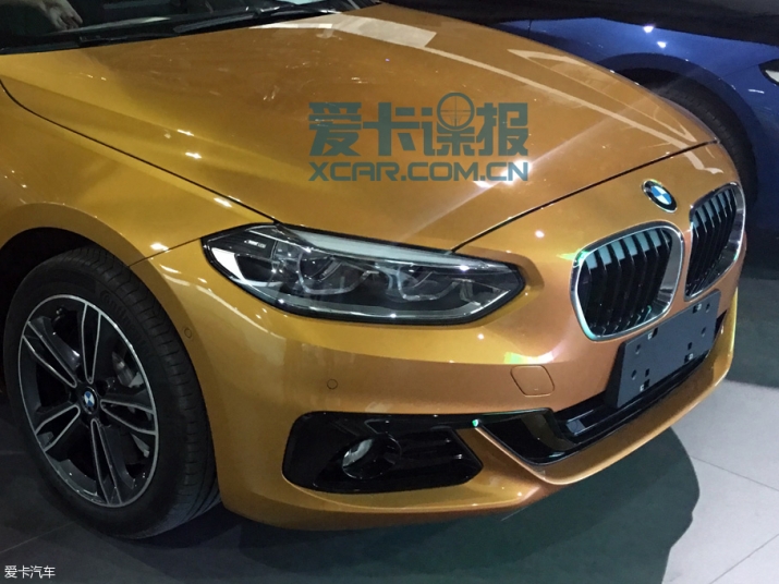 Xegiaothong_BMW_sedan_1series_mau_vang (7)