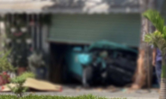 Vụ taxi công nghệ chạy ngược chiều tông chết người: Người phụ nữ trên ô tô tử vong- Ảnh 1.