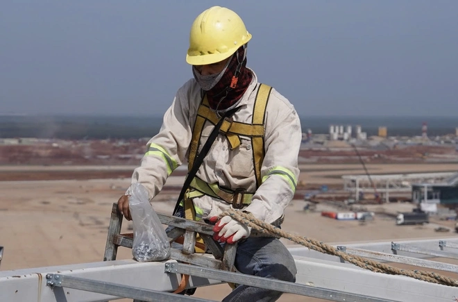 Tết không nghỉ trên công trường cao tốc, cầu lớn, sân bay Long Thành- Ảnh 9. Tết không nghỉ trên công trường cao tốc, cầu lớn, sân bay Long Thành- Ảnh 9.