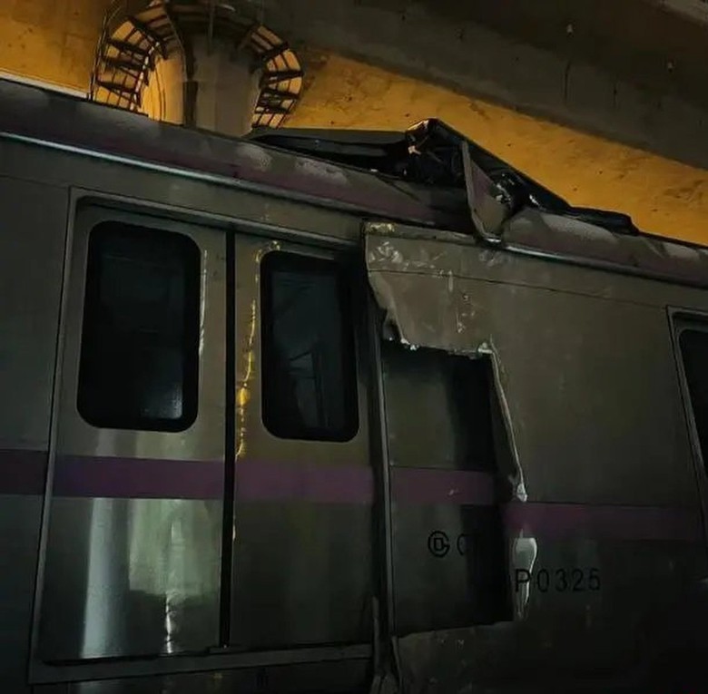 Toa t&agrave;u bị t&aacute;ch rời khỏi t&agrave;u hỏa tại Bắc Kinh, hơn 100 người bị thương - Ảnh 3.