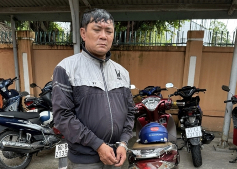 Bắt đối tượng tr&aacute;o v&eacute; số của người phụ nữ t&agrave;n tật - Ảnh 1.