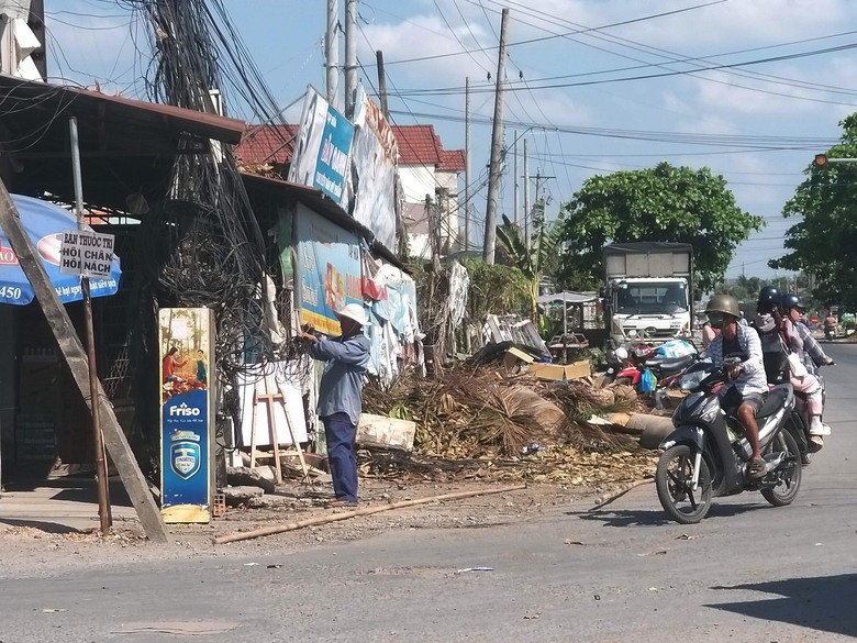 Người d&acirc;n th&aacute;o dỡ nh&agrave; cửa, b&agrave;n giao mặt bằng l&agrave;m cầu Rạch Miễu 2- Ảnh 2.