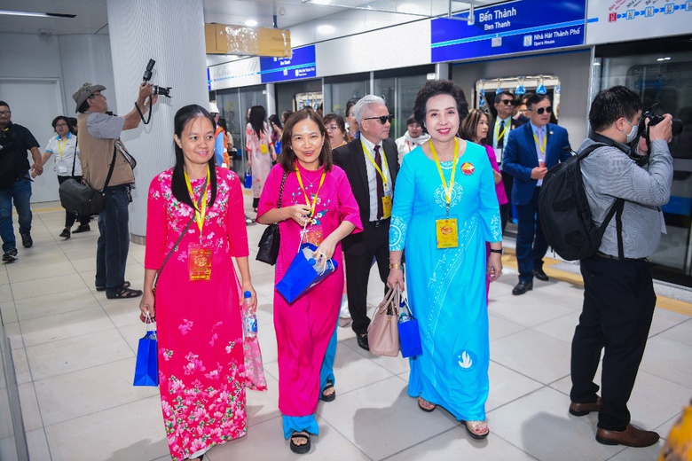 A group of people wearing matching outfits  Description automatically generated