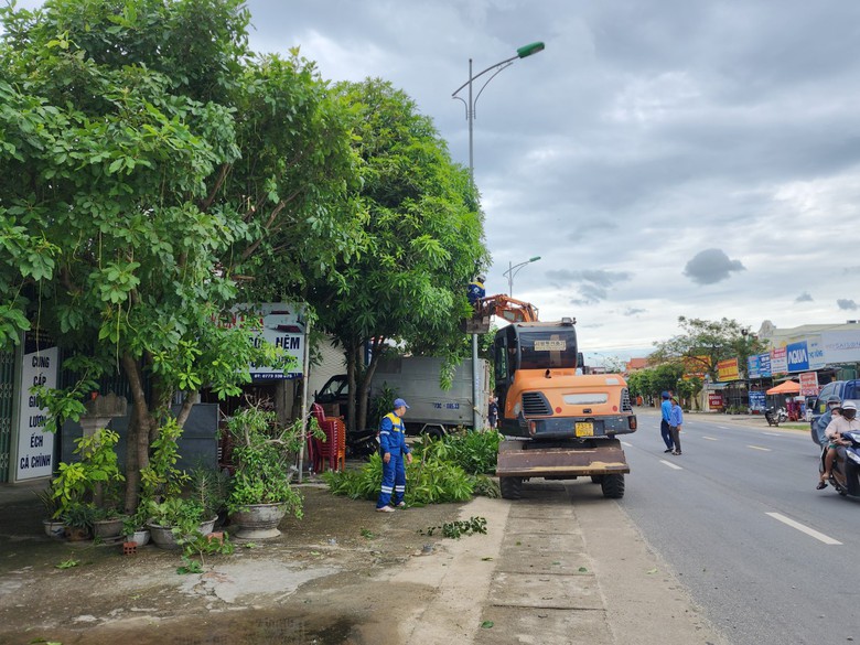 Quảng B&igrave;nh: Th&aacute;o dỡ h&agrave;ng qu&aacute;n lấn chiếm, quốc lộ 1A th&ocirc;ng tho&aacute;ng- Ảnh 1.