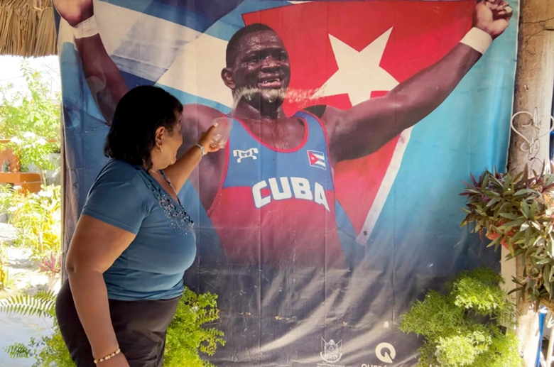 Cậu b&eacute; n&ocirc;ng d&acirc;n đi v&agrave;o lịch sử Olympic- Ảnh 3.