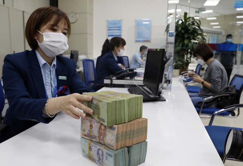 Thủ tướng y&ecirc;u cầu cắt giảm thủ tục h&agrave;nh ch&iacute;nh, giảm thuế VAT, l&atilde;i vay ng&acirc;n h&agrave;ng- Ảnh 1.