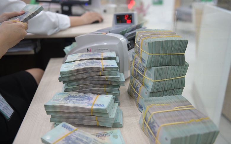 Chi trả chế độ tinh giản: Cụ thể h&oacute;a cam kết với c&aacute;n bộ, c&ocirc;ng chức d&ocirc;i dư- Ảnh 1.